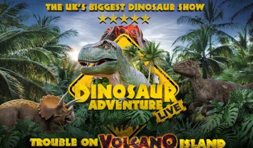An illustration of three different dinosaurs standing amongst trees in front of a volcano Writing reads The UKs biggest dinosaur show Dinosaur Adventure Live Trouble on Volcano Island