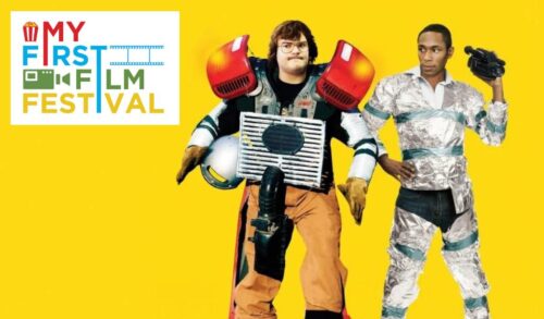 Two men stand wrapped up in foil and homemade costumes One is holding a video camera in his hand In the top left is the My First Film Festival logo