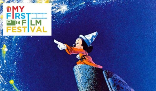 Mickey Mouse stands atop a rock wearing a red cloak and a wizards hat He is pointing toward a collection of stars In the top left corner is the My First Film Festival logo