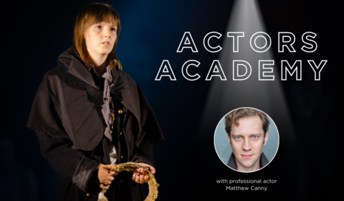 A girl stands on stage on stage holding a crown There is a spotlight shining on a headshot of a professional actor